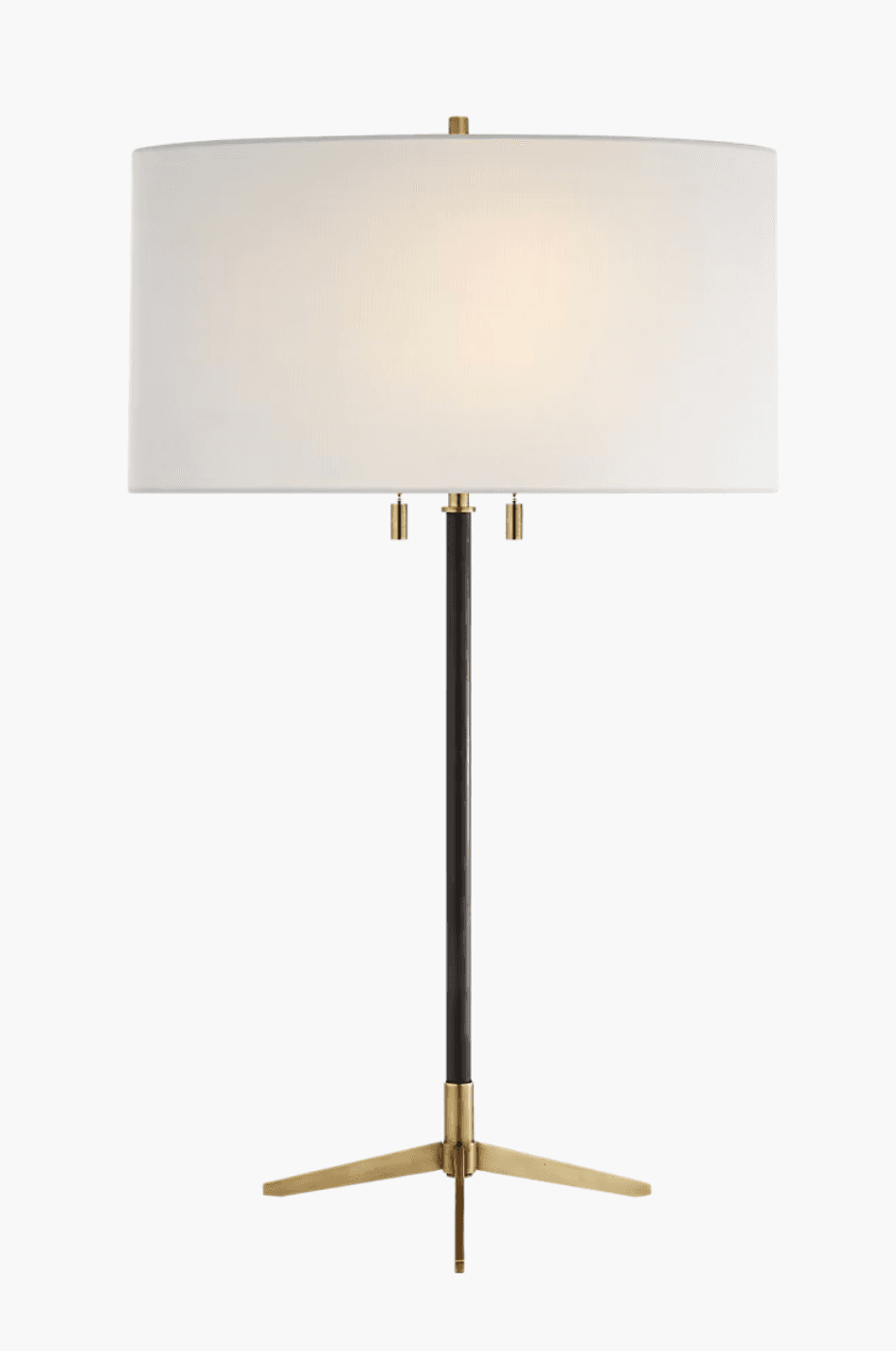 A floor lamp featuring a cylindrical white fabric shade, supported by a slender dark-colored pole. The pole is accented with brass fittings near the shade and terminates in a three-legged tripod base made of brass. — 3D model
