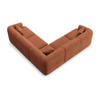 A modern modular L-shape sectional sofa upholstered in a ribbed, terracotta-colored fabric. The sofa consists of multiple connectable units, including corner pieces and armless sections, allowing for flexible configurations. It features soft, rounded edges and integrated armrests on the end pieces, presenting a contemporary and inviting aesthetic. Two matching throw pillows are visible, enhancing comfort. — 3D model