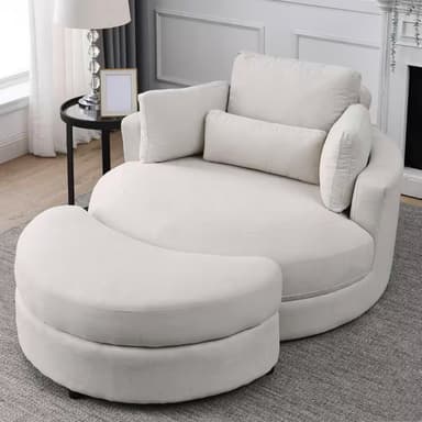 A contemporary, oversized round chaise lounge, upholstered in light-colored fabric, featuring a deep seat, high back with loose cushions, and a curved, complementary ottoman that fits snugly against the main unit. It appears to have a swivel base. — 3D model