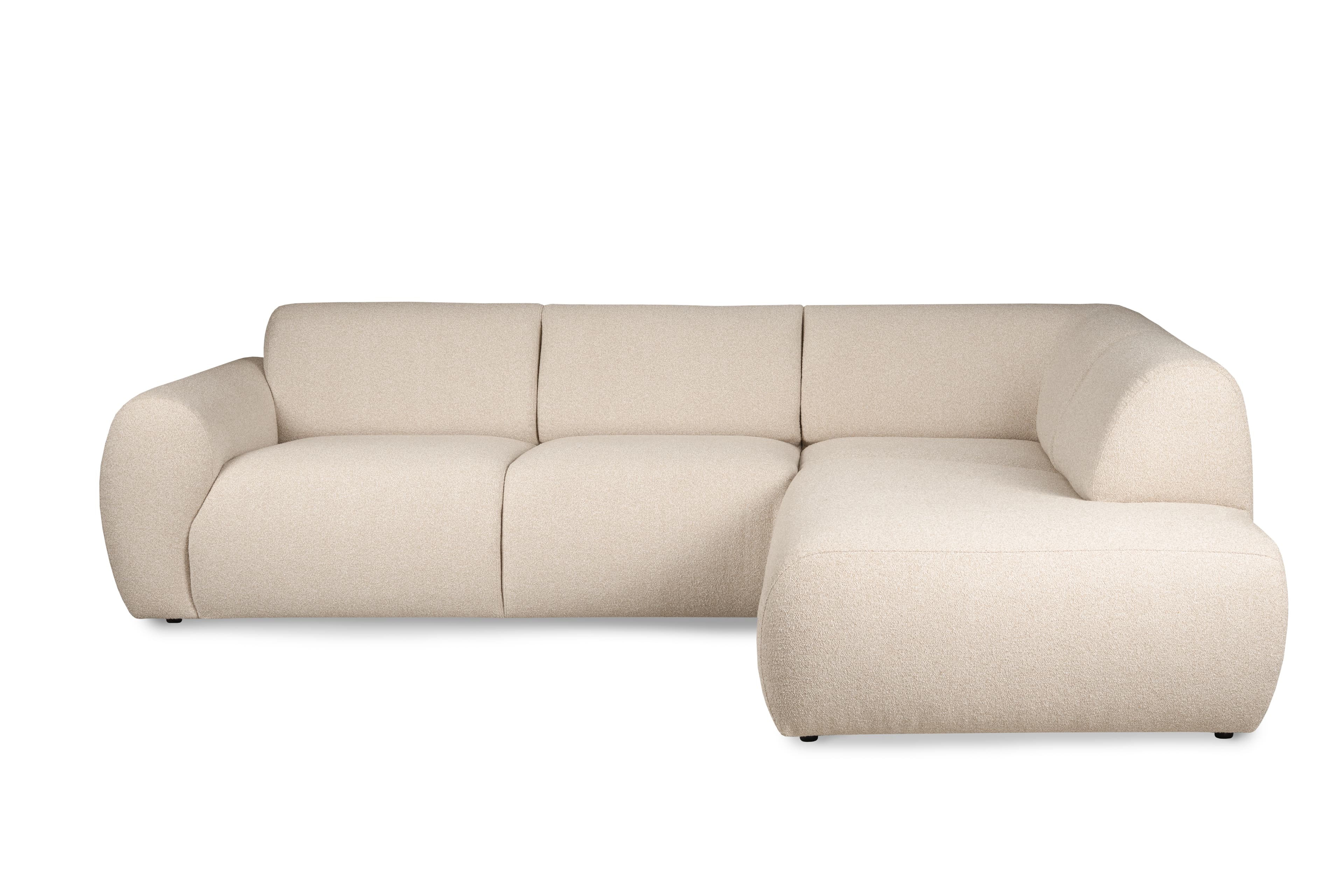 A contemporary sectional sofa featuring a three-seater unit combined with a right-hand facing chaise lounge, upholstered in a light beige, textured fabric. The design emphasizes soft, rounded edges and a low profile, offering a minimalist yet inviting aesthetic. — 3D model