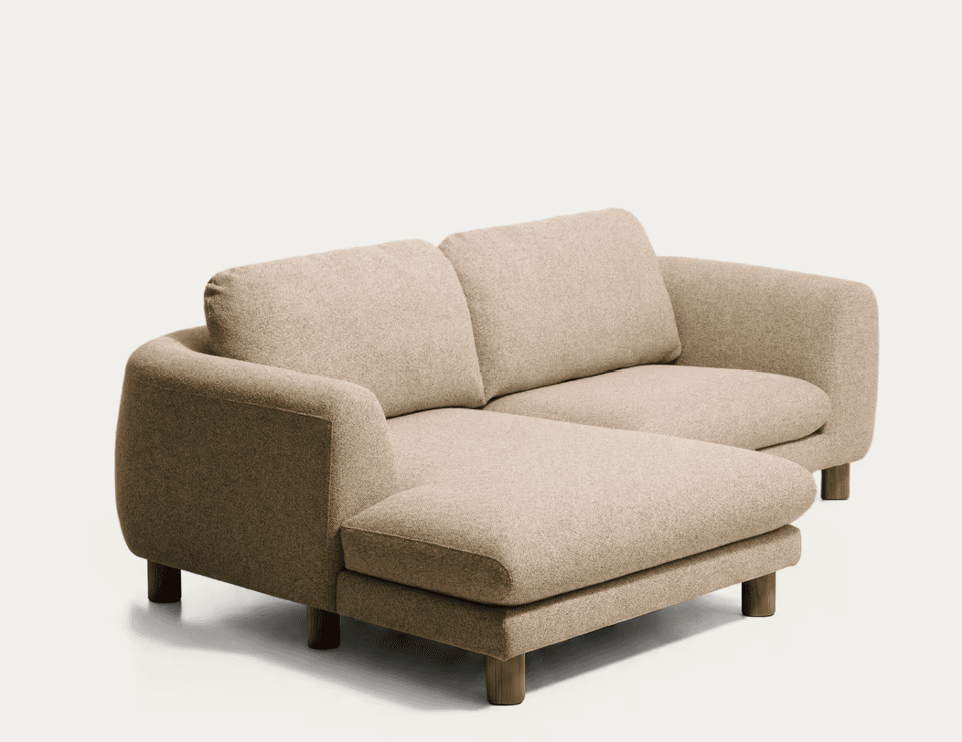 A modern two-piece sectional sofa with an integrated chaise lounge on the left side (when viewed from the front). The sofa is upholstered in a textured beige fabric and features rounded armrests and back cushions. It is supported by short, tapered wooden legs. — 3D model