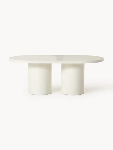 A modern coffee table with a cylindrical pedestal base and a broad, slightly bevelled, flat tabletop. The base appears to be constructed from a series of vertical rectangular tiles or segments, creating a fluted effect. The tabletop has rounded corners and a soft, matte finish. The overall design is minimalist and contemporary. — 3D model