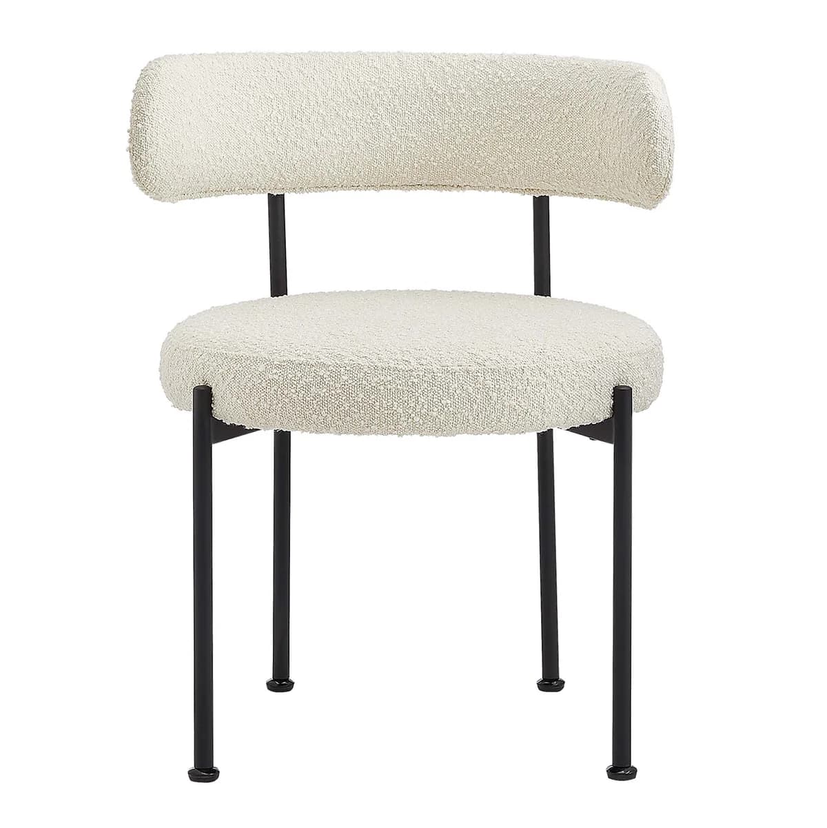 A modern armless chair featuring a rounded, padded seat and a cylindrical, horizontal backrest, both upholstered in a cream-colored boucle fabric. It rests on four slender, black metal legs. — 3D model