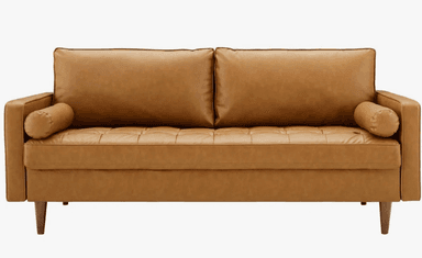 A modern two-seater sofa (loveseat) upholstered in tan-colored leather or faux leather. It features a square-arm design, button-tufted seat cushioning, two loose back cushions, and two matching cylindrical bolster pillows. The sofa is supported by four tapered wooden legs, giving it a mid-century modern aesthetic. — 3D model