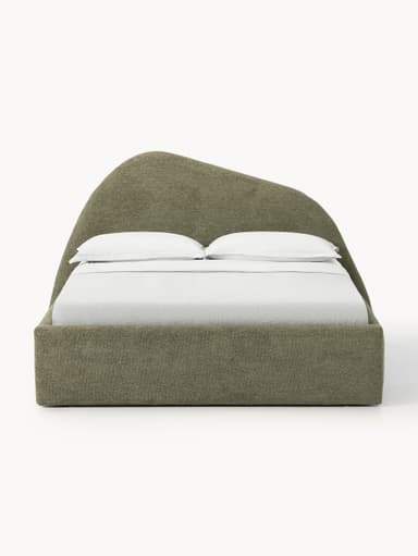 This is an image of a modern upholstered platform bed featuring a distinctive, large, and sculptural curved headboard. The bed frame and headboard are entirely covered in a textured, muted green/khaki fabric. The headboard curves upwards and then gently back, creating a visually interesting silhouette. The rear of the headboard appears to be finished in a darker, contrasting fabric or material. A white mattress and simple white bedding are visible on the bed frame. — 3D model