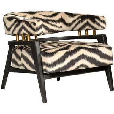 An upholstered accent armchair featuring a black and off-white zig-zag patterned fabric, a dark wooden frame, and brass cylindrical supports. — 3D model