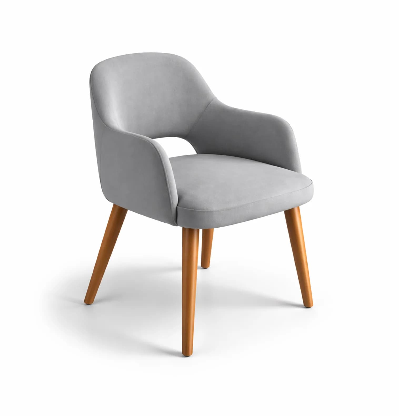 An upholstered armchair featuring a rounded, integrated back and armrest design, set on four splayed and tapered wooden legs. — 3D model