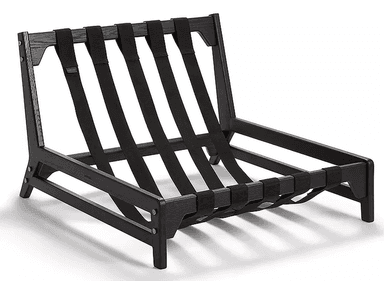 A modern, low-slung lounge chair frame constructed from black-stained wood with exposed black textile webbing for the seat and back support. The design features clean lines and visible brass pin fasteners. — 3D model