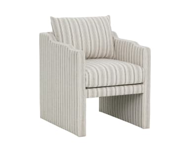 A modern armchair with a streamlined silhouette and a channeled backrest. The chair features integrated armrests and a boxy base. It is upholstered in a fabric with a vertical stripe pattern. A single loose back cushion is present. — 3D model