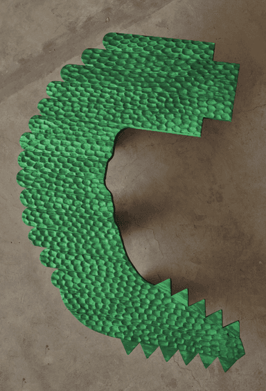 A vibrant green, elaborately carved low bench, shaped with an undulating profile reminiscent of a crocodile or dragon. The top surface is textured with a scale-like pattern, and the edges feature sharp, jagged protrusions. The bench is supported by chunky, faceted legs, all finished in the same bright green color. — 3D model