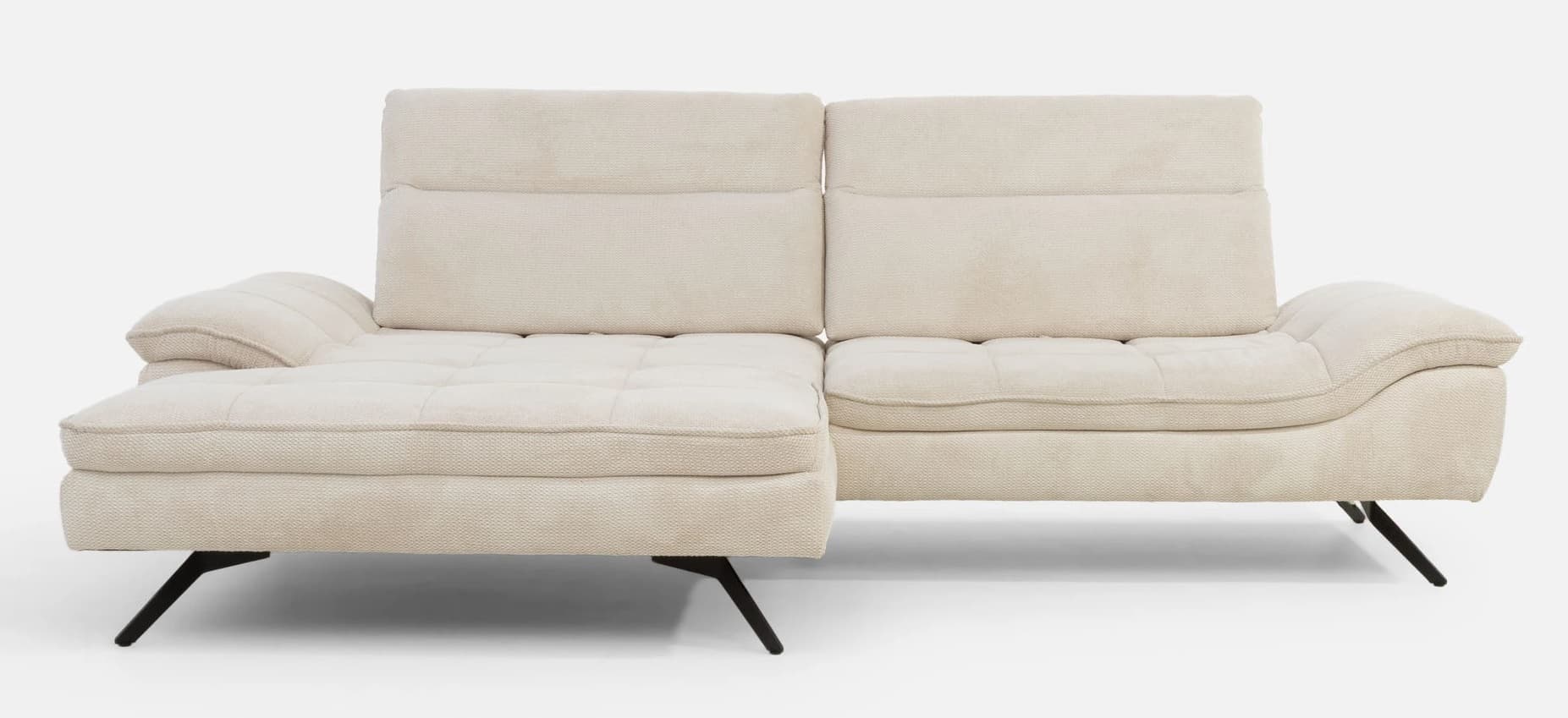 A contemporary sectional sofa with a chaise lounge extension. The sofa features plush, upholstered cushions with a textured fabric. The back cushions have horizontal stitching, and the seat cushions have a tufted grid pattern. It is supported by slender, angled black metal legs. — 3D model