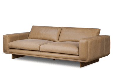A modern two-seater sofa upholstered in tan leather, featuring clean lines, thick cushions, and subtly rounded arm details, supported by recessed dark wood block legs. — 3D model