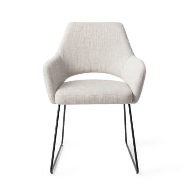 A contemporary armchair featuring a fully upholstered bucket-style seat and backrest in a light gray woven fabric. The chair is supported by a minimalist base of slender, black powder-coated metal legs, arranged in a distinctive inverted 'U' shape. — 3D model
