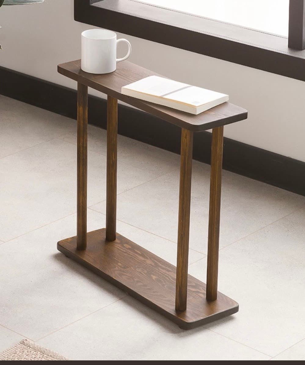 A minimalist console table crafted from dark-stained wood, featuring a narrow rectangular top, a matching base, and four slender cylindrical legs connecting the two planes. — 3D model