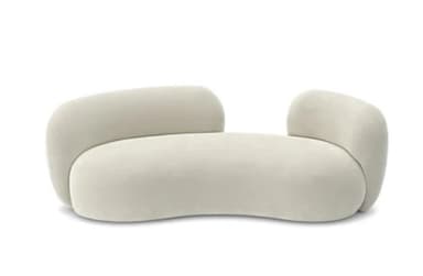 A modern upholstered lounge chair featuring a distinctive organic and curvilinear form. The chair is fully upholstered in a light, neutral fabric, with a low, rounded backrest that flows seamlessly into integrated, wide armrests. Its overall silhouette is characterized by soft, plump contours, suggesting comfort and a sculptural presence. — 3D model