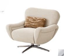 A contemporary lounge chair upholstered in a blush pink velvet-like fabric, featuring a sleek, integrated form and supported by a dark-finished four-spoke swivel base. The chair has a curved backrest and integrated armrests designed for comfort. — 3D model