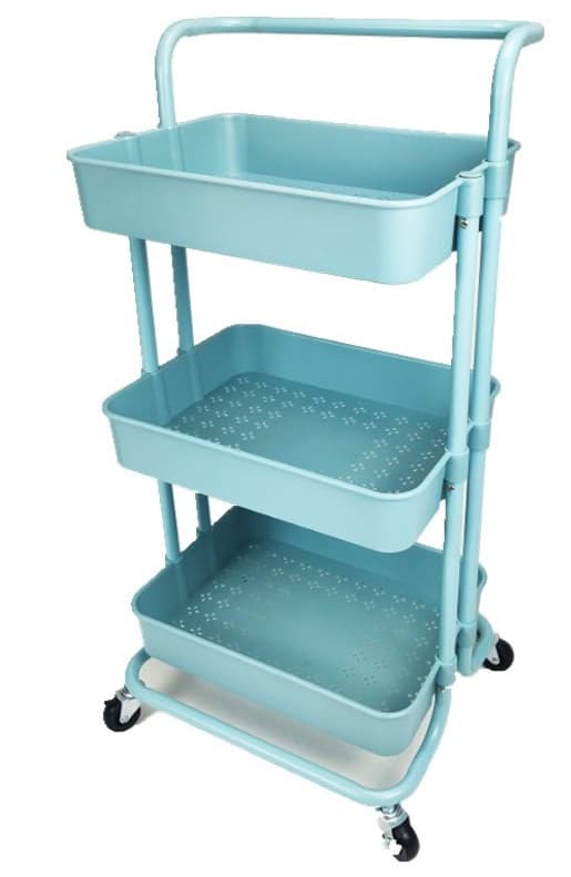 A light blue, three-tiered utility cart constructed from powder-coated metal. Each tier is a rectangular tray with a perforated bottom, designed for storage and organization. The cart features a curved handle at the top for easy maneuverability and four black casters for mobility. Its design is functional and modern. — 3D model