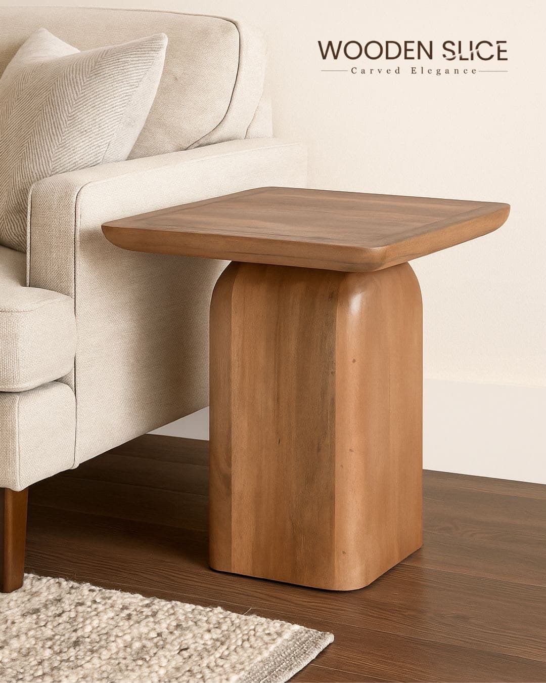A modern solid wood table featuring a square top with gently rounded corners and a substantial, column-like pedestal base, all crafted from natural wood. — 3D model