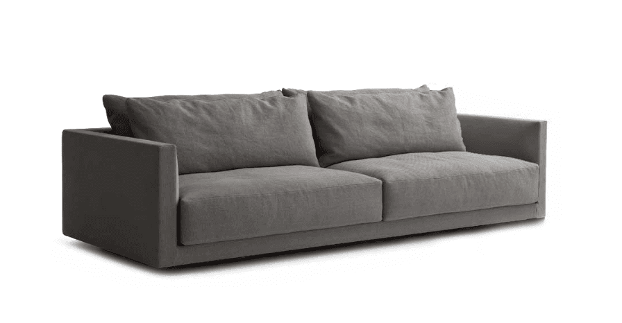A contemporary, armless sofa with a low profile. It features a boxy silhouette with clean lines, upholstered in a textured grey fabric. The seating consists of a single deep cushion, complemented by two large back cushions that offer a plush appearance. The armrests are integrated into the main frame, presenting a squared-off edge. — 3D model
