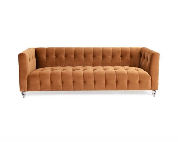 A three-seater sofa with a tufted upholstery design. The sofa features a straight back and arms, with a continuous tufted pattern running along both the back and seat cushions. It is supported by four transparent, possibly acrylic or glass, legs with a slightly tapered cylindrical shape. The upholstery appears to be a soft fabric with a velvet-like texture. — 3D model