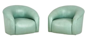 A compact, fully upholstered club chair featuring a barrel-shaped back and integrated armrests. The chair is covered in a smooth, light mint green material, likely faux leather or a soft-touch fabric, with a tight seat cushion. — 3D model