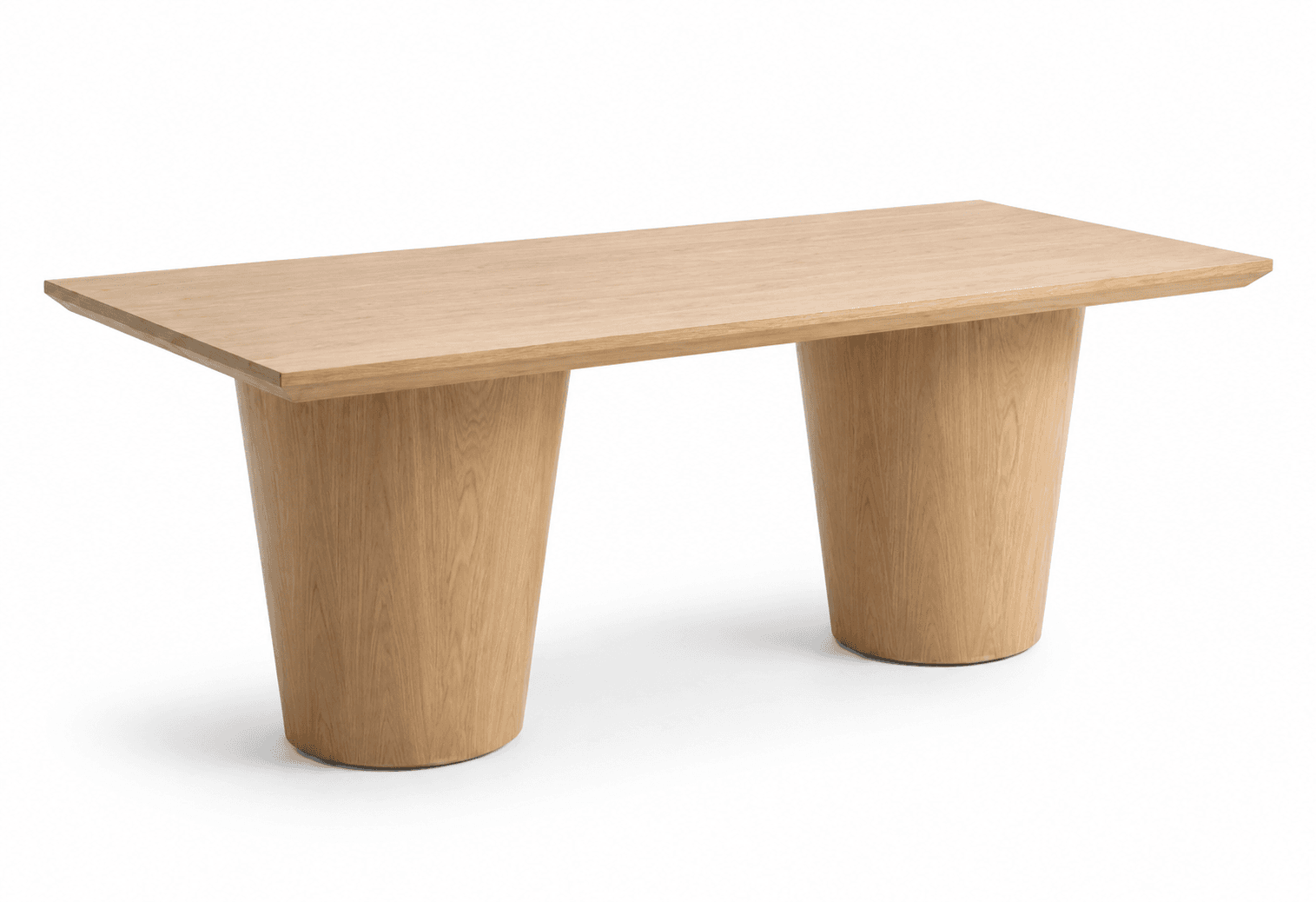 A rectangular dining table with a thick, flat tabletop and two substantial, tapered pedestal bases. The bases are cylindrical at the top, flaring outwards towards a wider circular foot. The grain of the wood is clearly visible, running vertically along the bases and horizontally across the tabletop. — 3D model