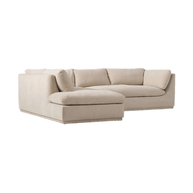 A contemporary L-shaped sectional sofa featuring a right-hand facing chaise lounge, upholstered in a light beige textured fabric. It has plush, deep seat cushions and back cushions, rounded armrests, and a low-profile base. — 3D model
