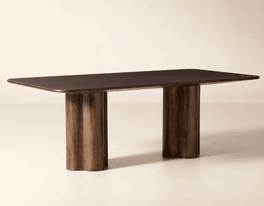 A dark stained wooden dining table featuring a rectangular top with rounded corners, supported by two cylindrical pedestal bases with vertical fluting. — 3D model