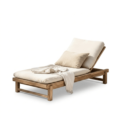 A contemporary outdoor chaise lounge featuring a robust teak wood frame with an adjustable backrest. It is fitted with plush cream-colored cushions for comfort, including a main body cushion and a separate back cushion. A light-colored throw blanket and a decorative throw pillow are also visible on the chaise, suggesting an inviting outdoor relaxation setup. — 3D model