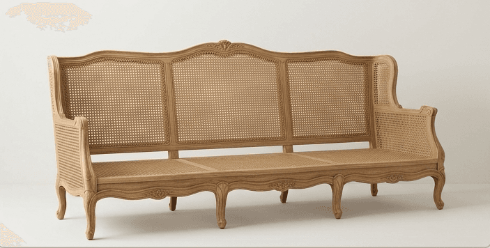 A long wooden seating unit with a cane backrest and seat, featuring an ornate carved frame and cabriole legs, in a light wood finish. — 3D model