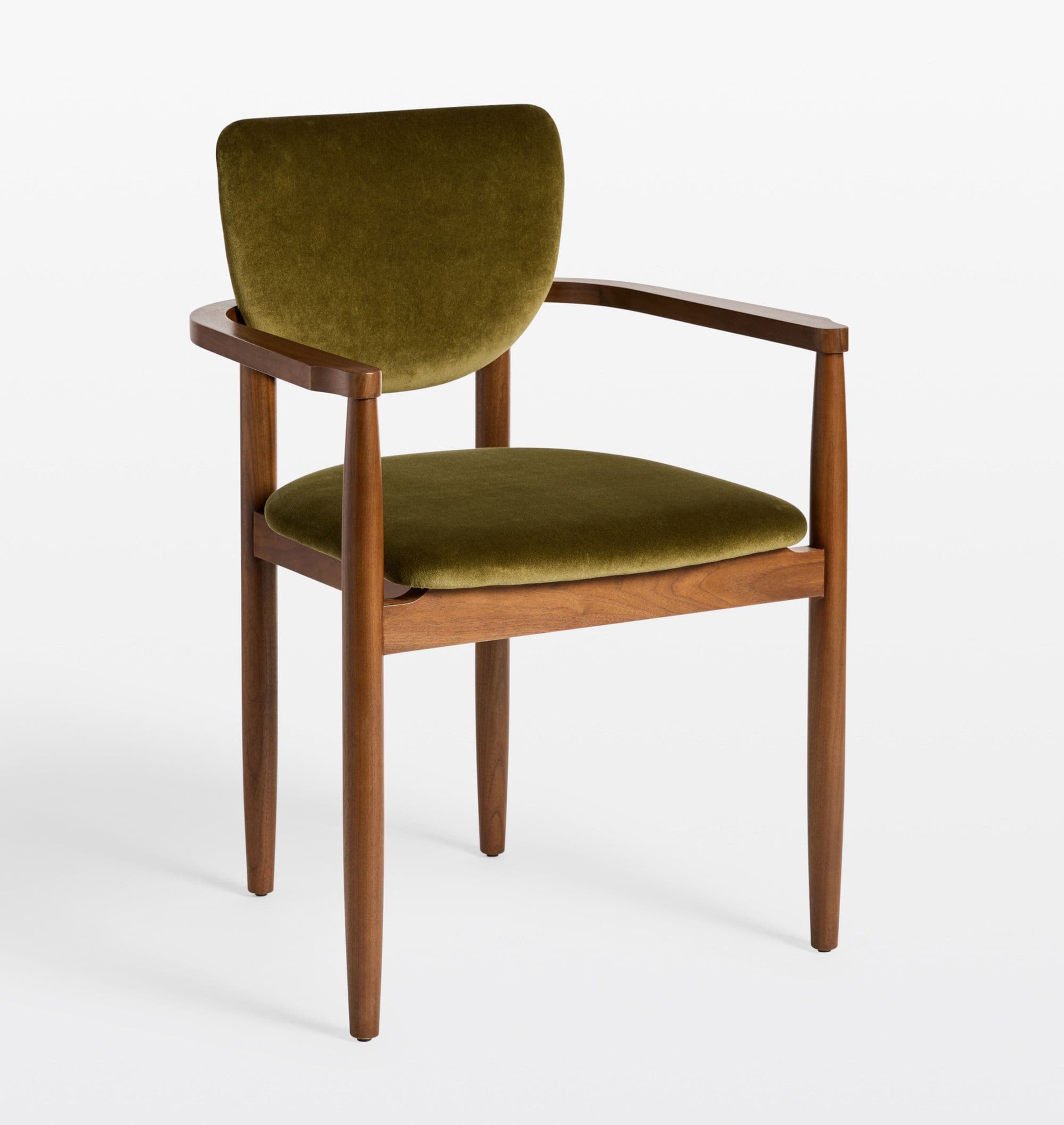 A wooden armchair with upholstered seat and backrest. The frame is constructed from wood with a visible grain, featuring tapered legs. The seat and the curved backrest are upholstered in a green velvet fabric. — 3D model