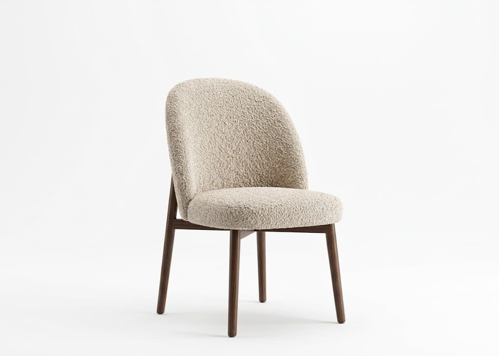 An upholstered armless chair featuring a curved backrest and a cushioned seat, both covered in a textured, light beige boucle-style fabric. The chair is supported by four dark brown, tapered wooden legs, creating a sleek and contemporary silhouette. The design emphasizes comfort and modern aesthetics. — 3D model