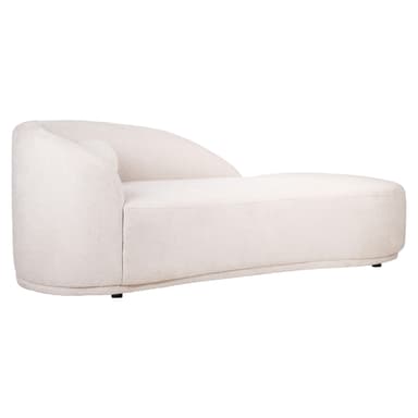A modern chaise lounge with a curved backrest and a rolled armrest on the left side. It features a rounded form and is upholstered in a textured fabric. A small, cylindrical bolster pillow is positioned on the left side of the chaise. — 3D model