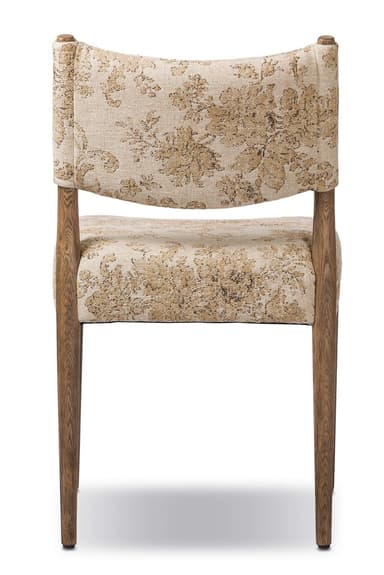 A side chair with a wooden frame and upholstered seat and back. The upholstery features a textured, floral pattern in beige and cream tones. The chair has four tapered wooden legs and a gently curved backrest. — 3D model