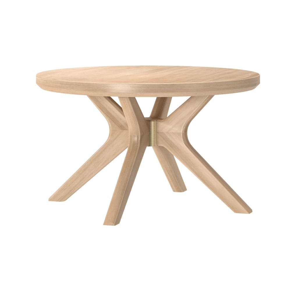 A round end table with a light wood finish. The tabletop has a subtle lip. The base consists of four splayed legs that intersect and are joined at the center by a brass-colored metal fitting, creating an abstract, sculptural form. — 3D model