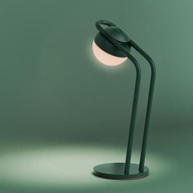 A contemporary table lamp featuring a dark green finish, a spherical light diffuser, and a minimalist design with a subtle red accent. — 3D model