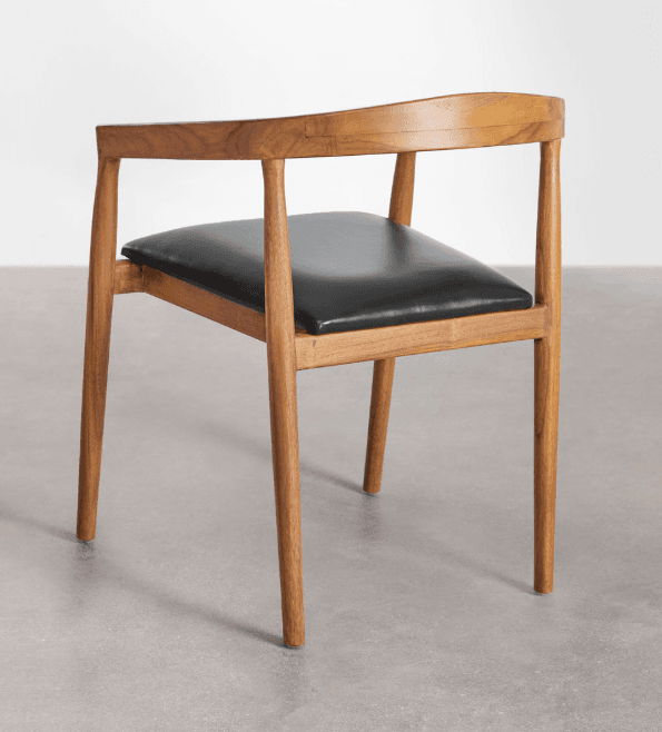 A Mid-Century Modern dining chair featuring a warm-toned wooden frame and a black upholstered seat. The backrest is gently curved, integrating seamlessly with the armrests. The chair stands on four tapered legs. — 3D model