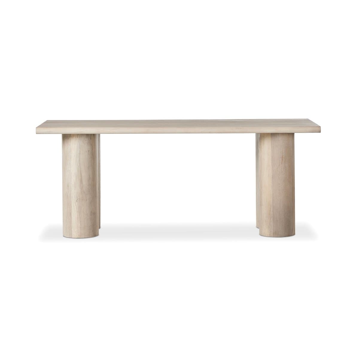 A console table with a thick, rectangular top and two cylindrical legs. The legs appear to be positioned towards the ends of the table and are integral to the overall structure. The finish is a light, natural wood tone. — 3D model