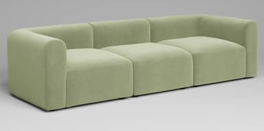 A contemporary three-seater modular sofa upholstered in a light green fabric. The design features a blocky silhouette with rounded track arms that flow into a low, integrated backrest. The sofa is composed of three distinct modular sections. — 3D model