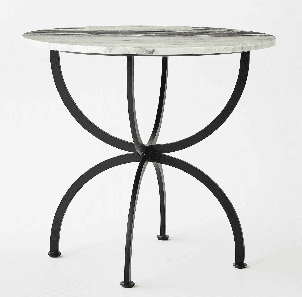 A small, round table featuring a polished white and gray veined marble top, supported by a distinctive black matte metal base composed of four curved, interlocking legs that converge at the center and splay outwards. — 3D model