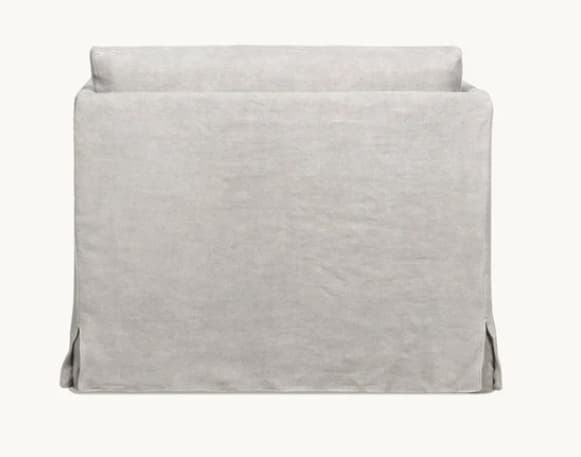 A light grey or off-white slipcovered sofa, viewed from the back, featuring a full skirted base with corner pleats and a separate back cushion. — 3D model