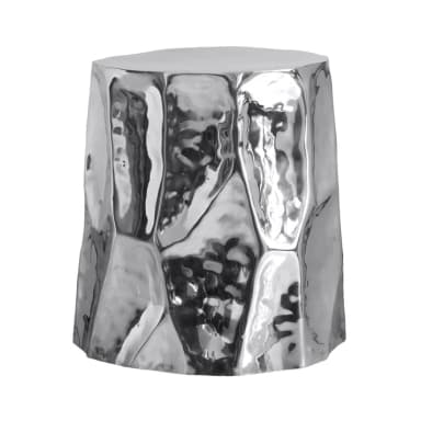 A highly reflective, silver-colored side table with a hammered, irregular geometric pattern on its base and a smooth, flat top. The overall form is cylindrical with a slightly tapered base. — 3D model