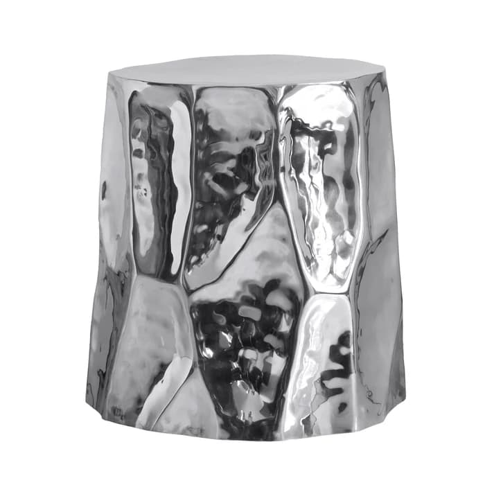A highly reflective, silver-colored side table with a hammered, irregular geometric pattern on its base and a smooth, flat top. The overall form is cylindrical with a slightly tapered base. — 3D model