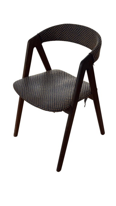 A wooden chair with upholstered seat and backrest. The upholstery features a repeating pattern of small, diamond-shaped motifs in a contrasting color. The frame appears to be made of wood with a dark finish. The chair has a simple, functional design. — 3D model