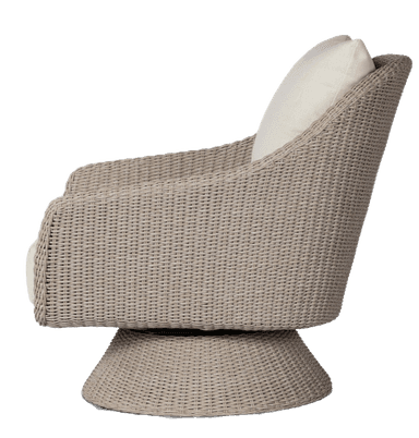 A swivel armchair with a rounded, enveloping backrest and arms. The base is a wide, tapered pedestal that allows for rotation. The construction appears to be woven, likely synthetic rattan or wicker, giving it a textured, naturalistic appearance. It is upholstered with thick, light-colored cushions for the seat and back. — 3D model