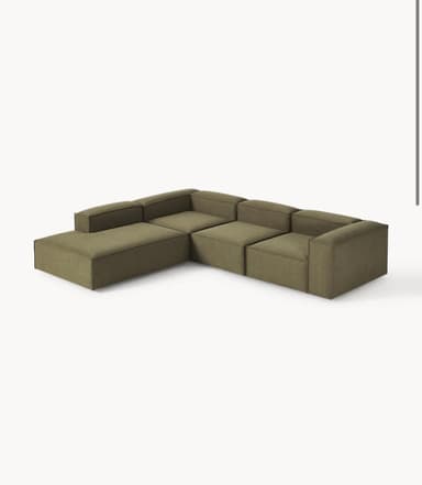 A sectional sofa with a modular design, featuring low-profile, block-like modules. It is upholstered in a textured, olive-green fabric and configured in an L-shape. The sofa has clean lines and a contemporary aesthetic, with visible seams separating the individual modules. The arms and backrests are integrated into the modular units. — 3D model