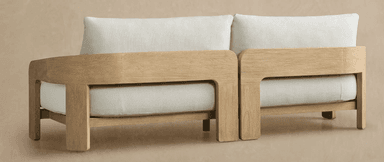 A two-seater loveseat featuring a distinct exposed wooden frame made of light-toned oak. It is upholstered with off-white fabric cushions for both the seat and back, providing a minimalist and contemporary aesthetic. The armrests are integrated into the curved wooden frame, presenting a clean, open design. — 3D model