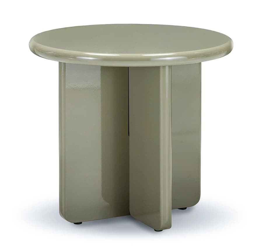 A modern, round-topped end table with a unique pedestal base. The base is composed of four vertical, rectangular supports that intersect or are positioned closely together, creating a segmented, sculptural effect. The table has a glossy finish and a simple, clean aesthetic. — 3D model