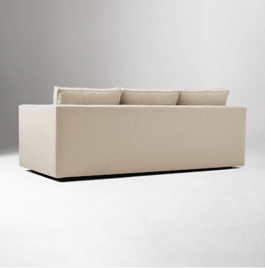A contemporary sectional sofa upholstered in a light beige woven fabric, featuring a right-hand facing chaise lounge, low square arms, and loose back and seat cushions with tailored piping. — 3D model