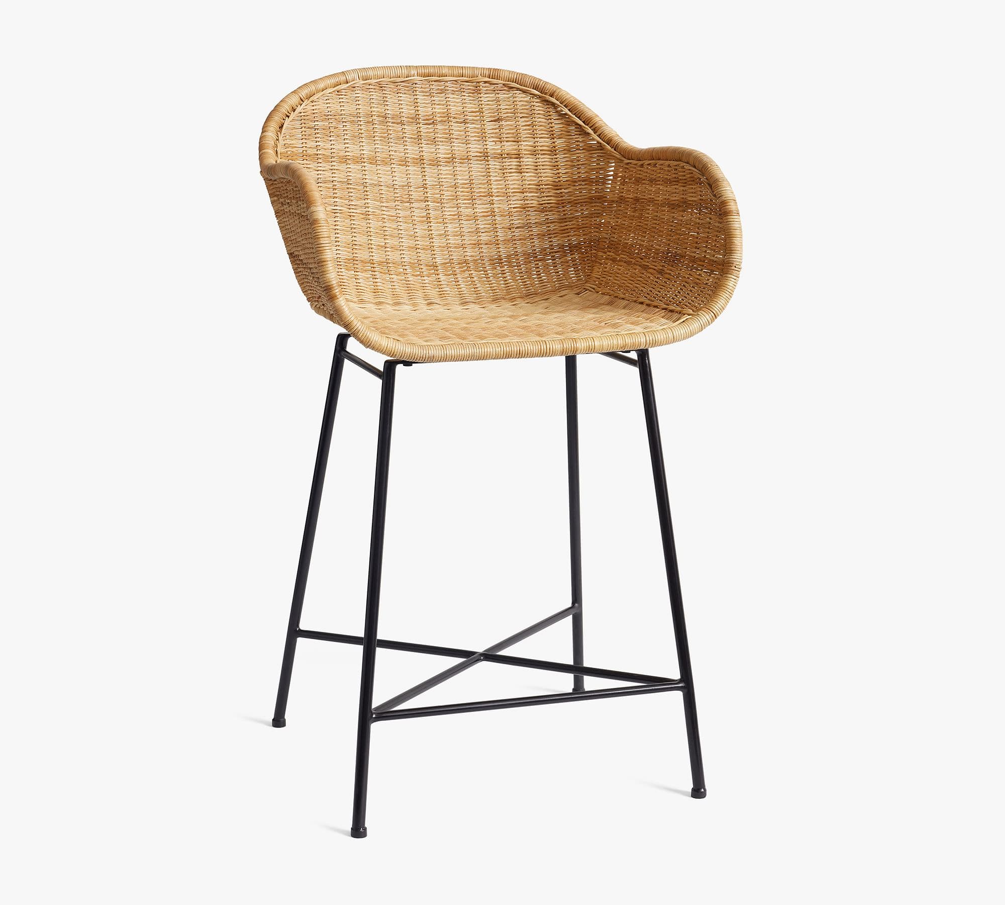A bar stool featuring a natural woven rattan seat and backrest with integrated armrests, supported by a minimalist black metal frame with an X-shaped footrest. — 3D model